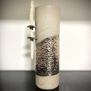 Stoneware vase with driftwood
