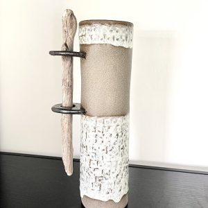 Stoneware vase with driftwood