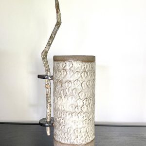 stoneware vase with driftwood